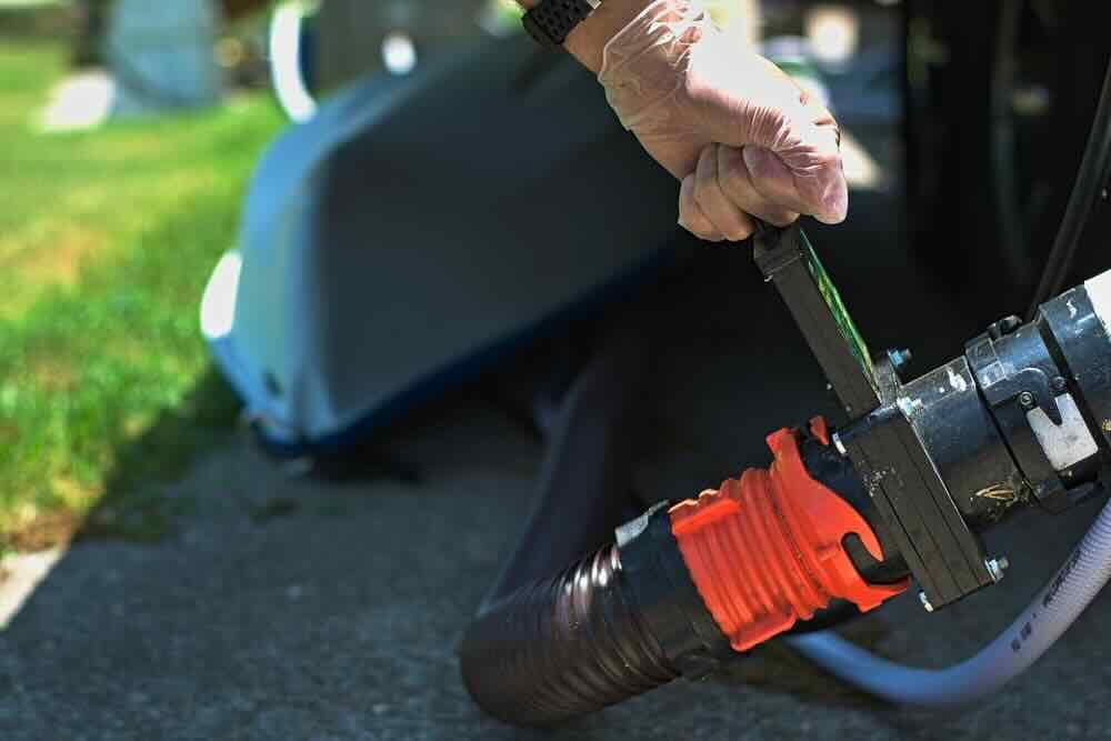 RV mobile repair service performing plumbing repairs and winterization